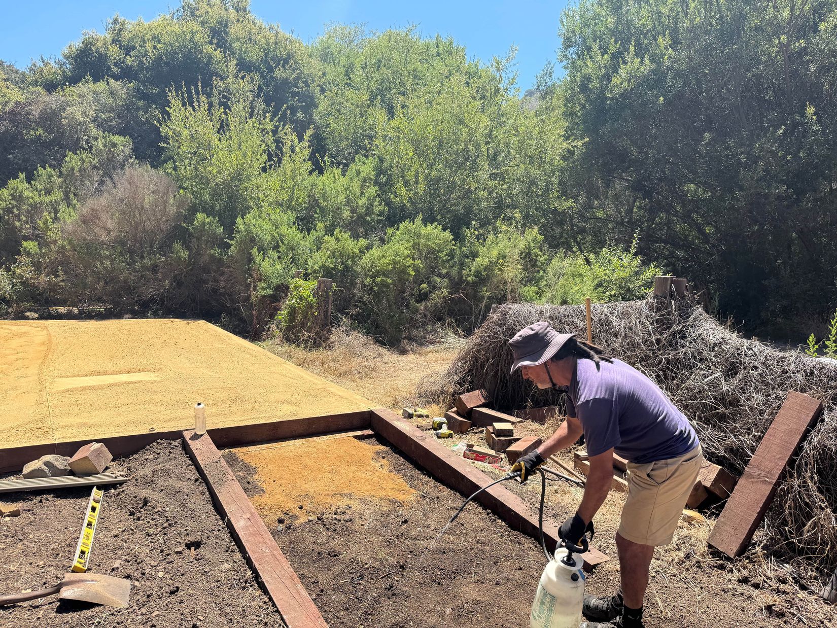 Juan preparing the tent pad - before the dg is placed