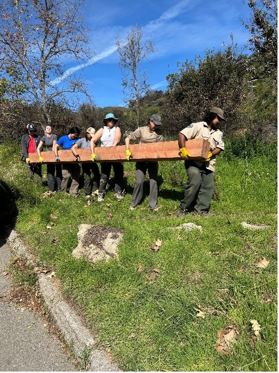 Scouts Carrying Lumber to site
